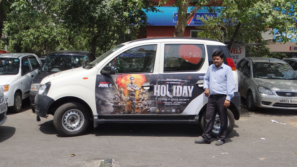 Akshay Kumar's Holiday emifreecar.com, holiday movie car advertisement in New Delhi