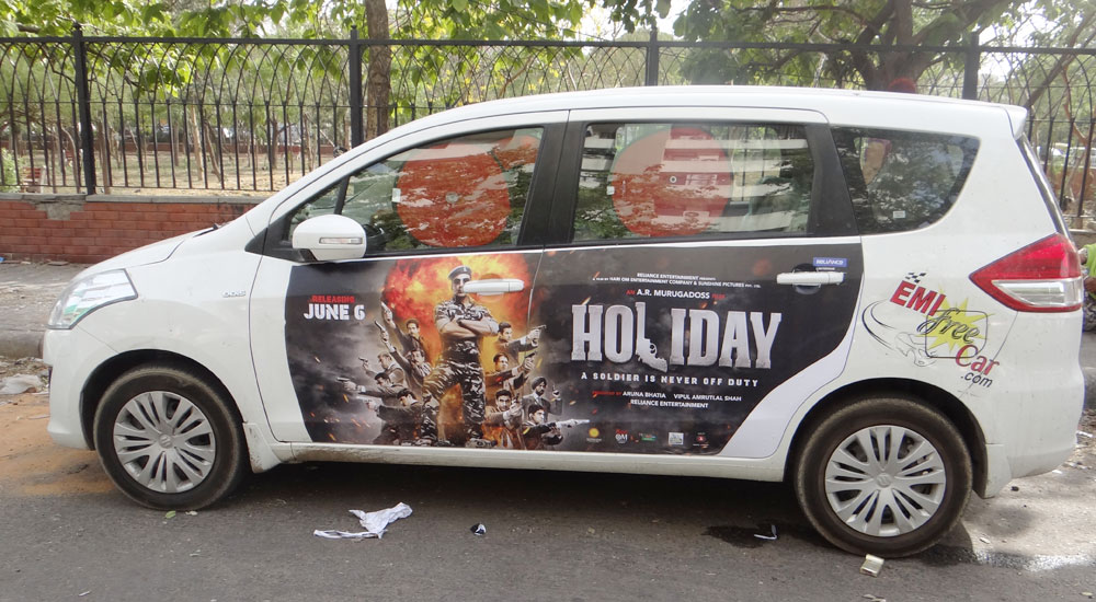 Akshay Kumar's Holiday emifreecar.com, holiday movie car advertisement in New Delhi