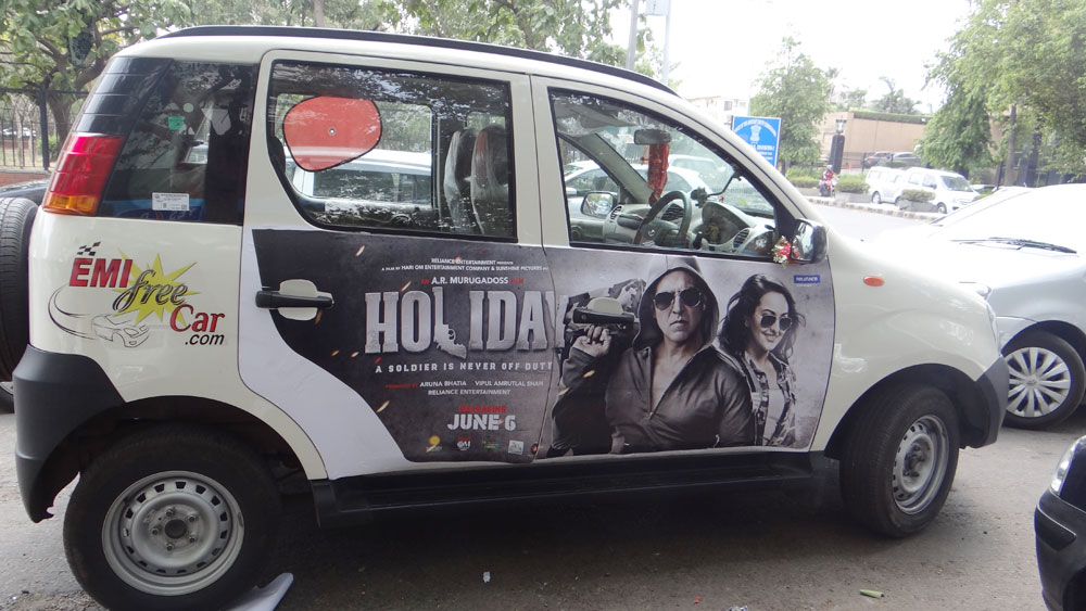 Akshay Kumar's Holiday emifreecar.com, holiday movie car advertisement in New Delhi