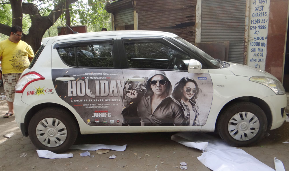 Akshay Kumar's Holiday emifreecar.com, holiday movie car advertisement in New Delhi