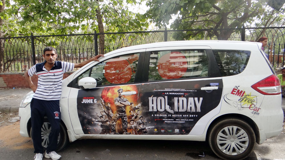 Akshay Kumar's Holiday emifreecar.com, holiday movie car advertisement in New Delhi