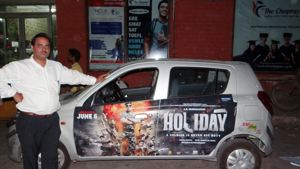 Akshay Kumar's Holiday emifreecar.com, holiday movie car advertisement in New Delhi