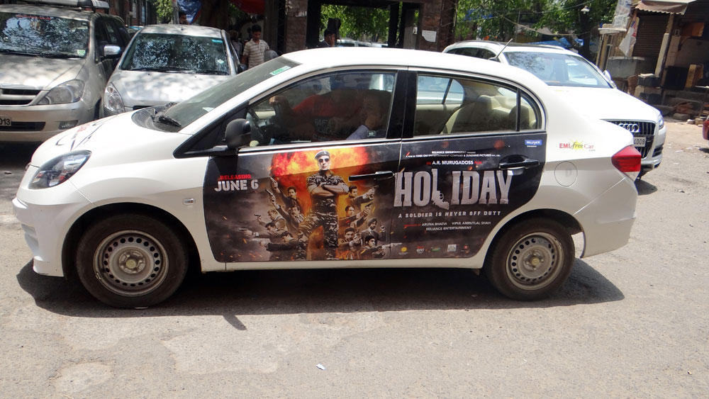 Akshay Kumar's Holiday emifreecar.com, holiday movie car advertisement in New Delhi