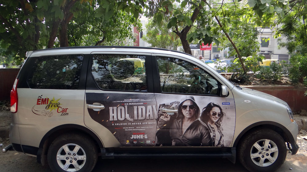 Akshay Kumar's Holiday emifreecar.com, holiday movie car advertisement in New Delhi