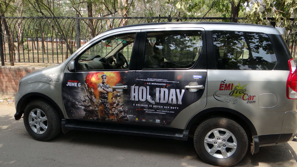 Akshay Kumar's Holiday emifreecar.com, holiday movie car advertisement in New Delhi