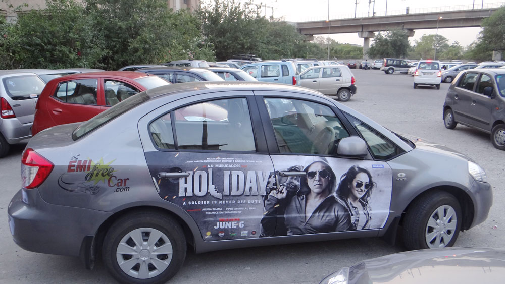 Akshay Kumar's Holiday emifreecar.com, holiday movie car advertisement in New Delhi