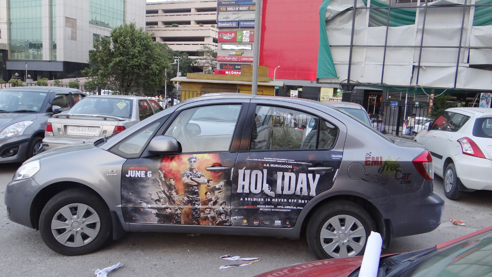 Akshay Kumar's Holiday emifreecar.com, holiday movie car advertisement in New Delhi