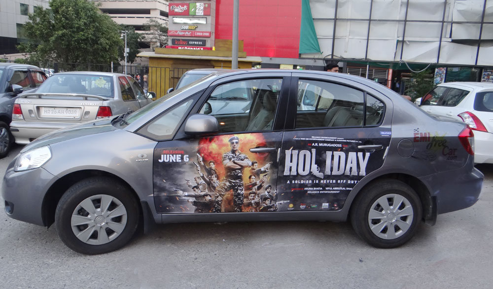 Akshay Kumar's Holiday emifreecar.com, holiday movie car advertisement in New Delhi