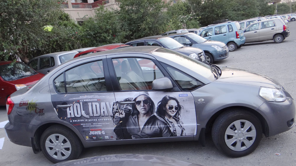 Akshay Kumar's Holiday emifreecar.com, holiday movie car advertisement in New Delhi