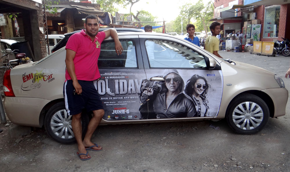 Akshay Kumar's Holiday emifreecar.com, holiday movie car advertisement in New Delhi