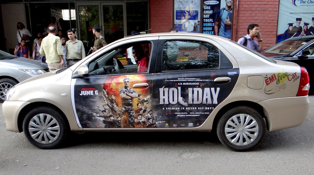 Akshay Kumar's Holiday emifreecar.com, holiday movie car advertisement in New Delhi