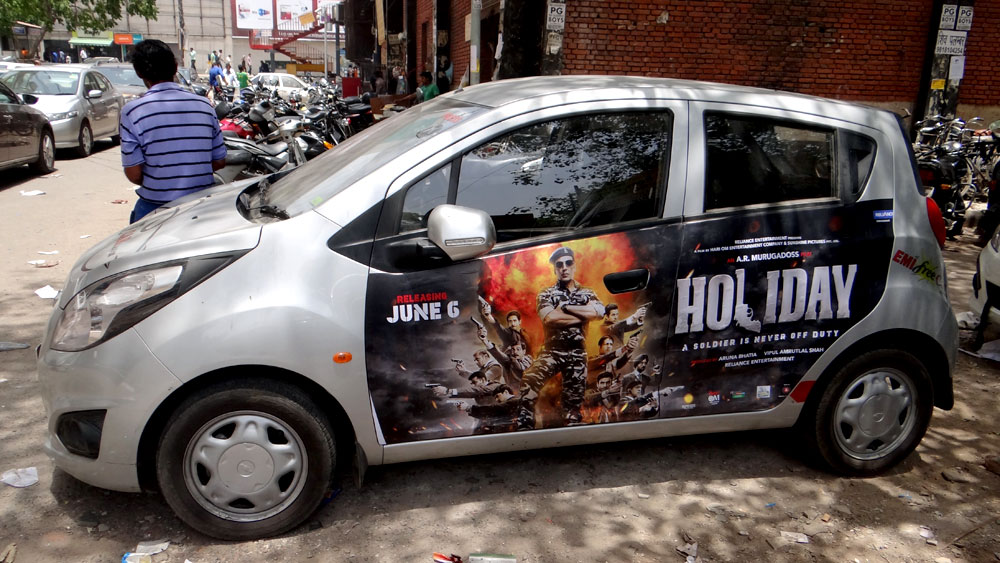 Akshay Kumar's Holiday emifreecar.com, holiday movie car advertisement in New Delhi
