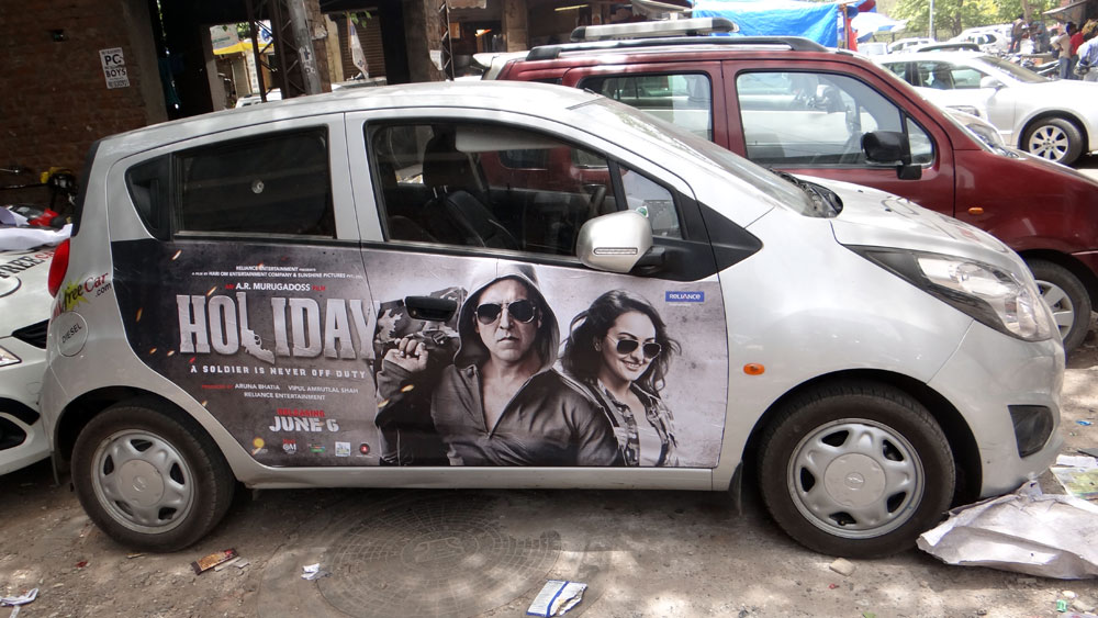 Akshay Kumar's Holiday emifreecar.com, holiday movie car advertisement in New Delhi